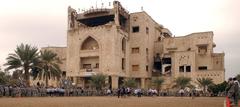 U.S. Army Soldiers watching a flag football game at Al Salam Palace