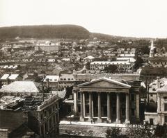 The Bank of Montreal under construction at Place d'Armes, seen from Notre Dame Basilica in Montreal