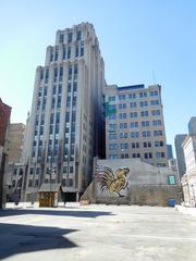 Vacant lot at 14-48 rue Saint-Jacques, Montreal with surrounding buildings