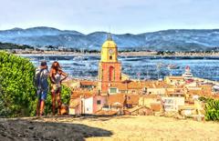 Scenic view of Saint-Tropez with church tower and hills