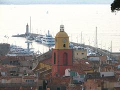 Aerial view of Saint-Tropez harbor with yachts and waterfront buildings