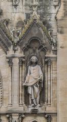 statue on the facade of the Saint Baudilus church in Nîmes