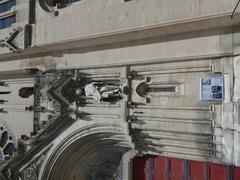 Statue at the right of the portal of Église Saint-Baudile de Nîmes