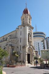 Saint-Pierre Church in Palavas-les-Flots with Phare de la Méditerranée in the background