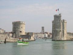 La Rochelle harbour with docks, boats, and historical buildings