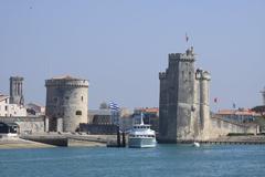 The entrance of the Port of La Rochelle with Saint-Nicolas tower on the right and the Chain tower on the left