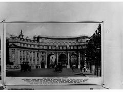 New Admiralty Arch in London with traffic and pedestrians