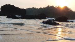 natural laterite stone formation at Dharmadam Beach