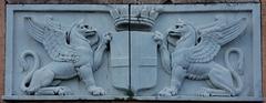 Griffins symbol of Genoa on historic aqueduct siphon bridge