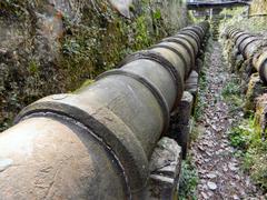 Cast-iron pipes of historical aqueduct in Molassana, Genoa