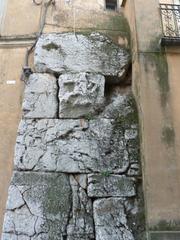 Ancient bas-relief sculpted on megalithic stone from 5th century BC