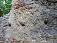 Arezzo Amphitheater monument in Italy featuring opus reticulatum pattern