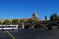 Piazza Paolo Borsellino in Catania with bus station and historical arches