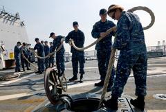 USS Momsen crew stowing mooring lines during CARAT Indonesia 2013