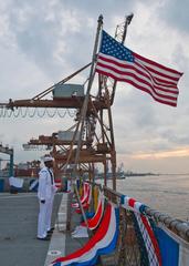 USS Tortuga sailors stand by for evening colors in Jakarta, Indonesia during CARAT 2013