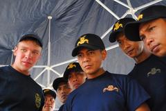 Navy Diver instructs Indonesian Sailors on underwater vehicle