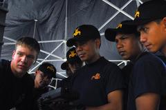 Navy Diver instructs Indonesian Navy Sailors on underwater vehicle