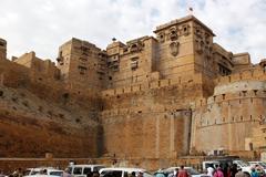 Fort Jaisalmer in India with yellow sandstone architecture under a clear blue sky