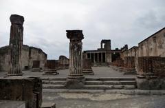 Archeological ruins of Pompeii with mountains in the background