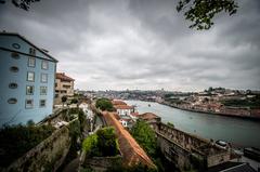 aerial view of Porto, Portugal featuring the Douro River and historic buildings