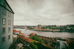 aerial view of Porto, Portugal showcasing the Douro River, traditional buildings, and iconic Dom Luís I Bridge