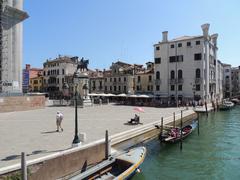 Rio dei Mendicanti canal in Venice with historic buildings and bridge