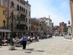 a picturesque view of Castello in Venice with historic buildings and narrow canals