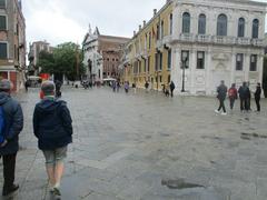 A scenic canal view in Venice with historic buildings and boats