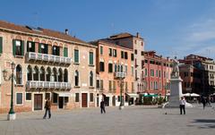 Grand Canal in Venice with gondolas and historic buildings