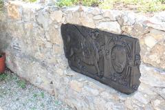 Relief set into wall at Castello Brown terrace, Portofino