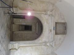 Entrance hall and staircase to the first floor of Castello Carlo V in Lecce, Italy