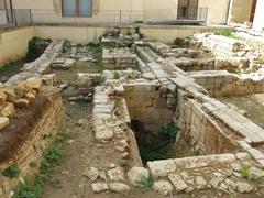 Interior courtyard of Castello Carlo V in Lecce with ongoing archaeological excavations