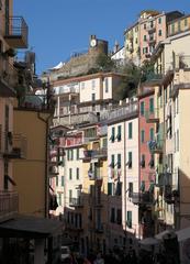 Via Colombo in Riomaggiore with a view of the castle