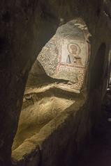 Catacombs of Saint Gennaro with ancient frescoes and stone carvings