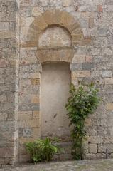 side portal of the church of Santa Maria Assunta in Monteriggioni