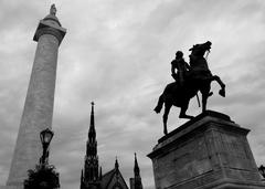 Washington Monument, church spires, and Lafayette statue at Mt. Vernon Place