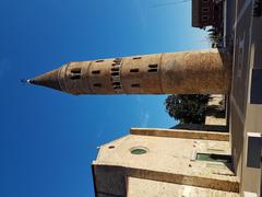 Duomo di Caorle cathedral entrance with bell tower