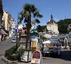 Karlsbad street Marktgasse with historic buildings and parked cars