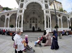 Streetlife in Karlsbad with historical wooden Market Colonnade