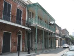 Gallier House with green balcony in French Quarter, New Orleans