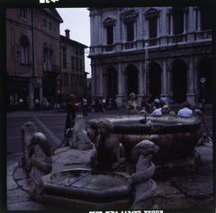 Piazza Vecchia in Bergamo with Fontana Contarini and architectural details of surrounding structures