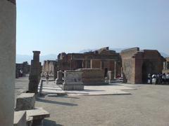 ancient Roman forum ruins under a blue sky