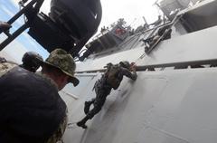 U.S. and Bangladeshi sailors during a visit, board, search and seizure exercise in Chittagong, Bangladesh