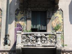 Casa Galimberti facade via Malpighi figures