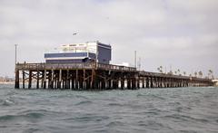 Newport Pier at sunset with calm ocean waters