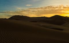 Sunset in the Huacachina desert, Peru