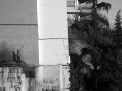 Man standing on top of Arab wall near Almudena Cathedral