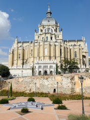 Muslim wall of Madrid and rear facade of the Cathedral of Our Lady of La Almudena