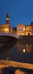 Ponte di Mezzo bridge in Pisa on a sunny day