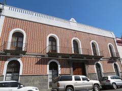 Casona with PRI emblem in downtown Puebla